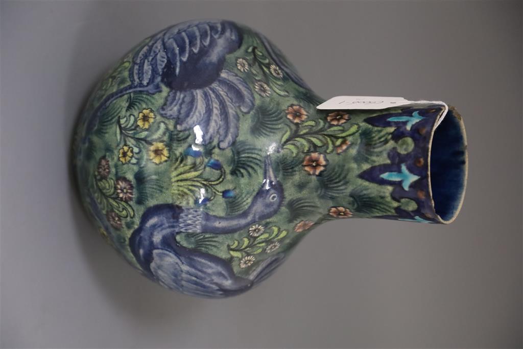 A rare William de Morgan Ostrich bottle vase, c.1888-97, painted by Joe Juster, 24cm high, 18cm wide